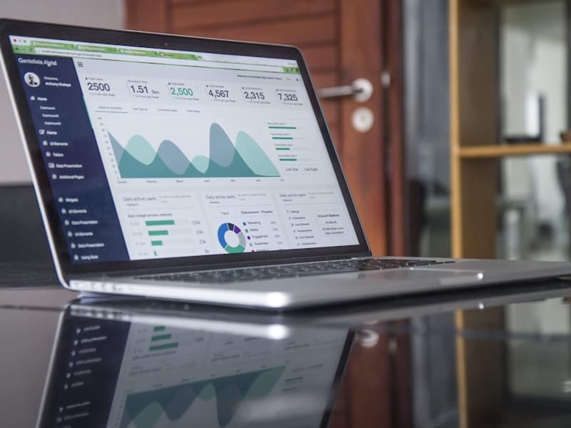 Fundraising analytics and growth charts on a laptop