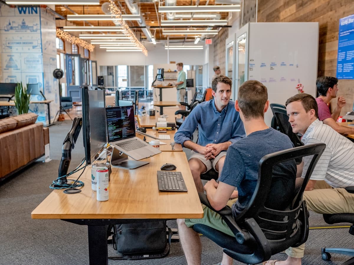 Founders collaborating in a fundraising meeting
